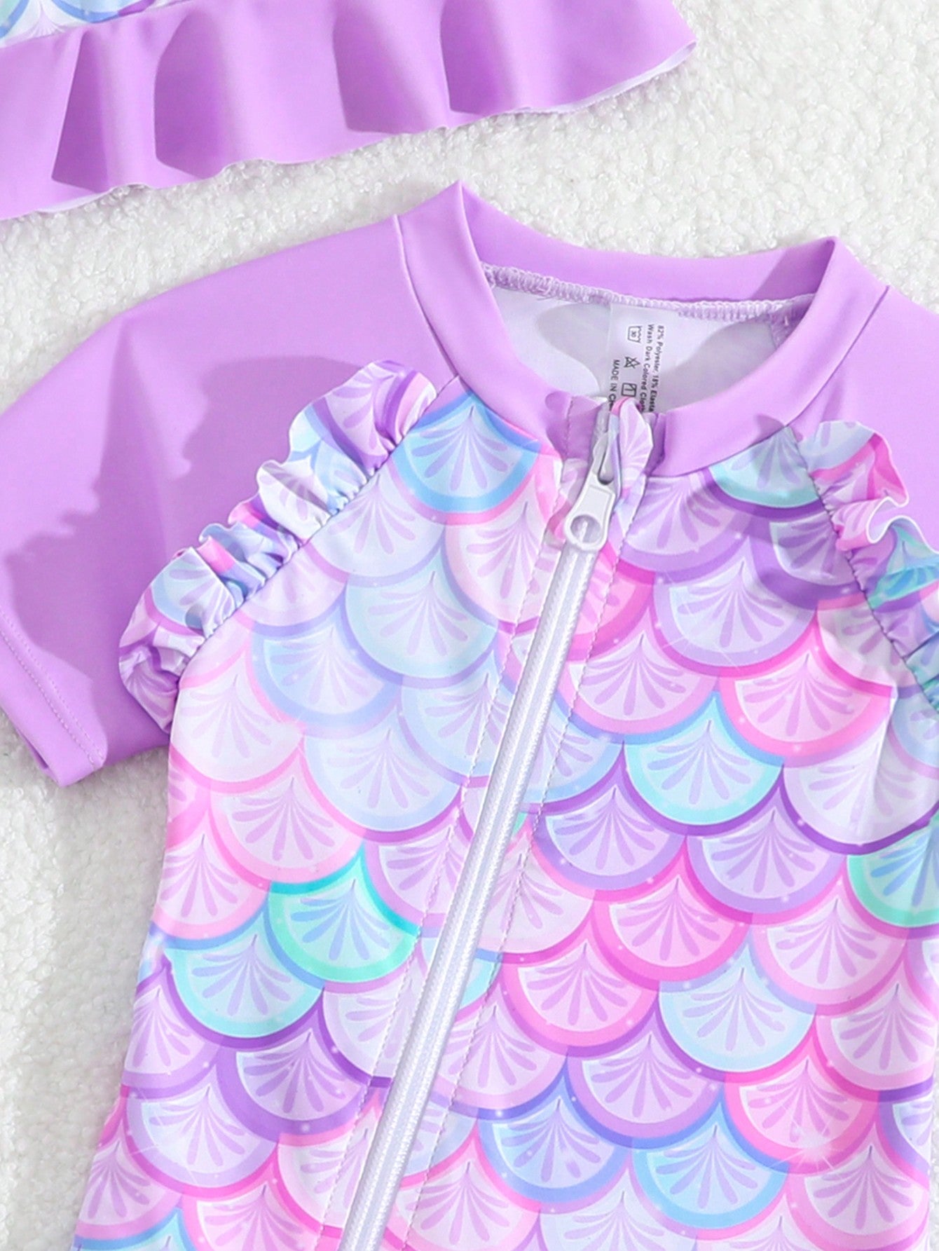 Traje de baño lila para bebé con estampado de sirena