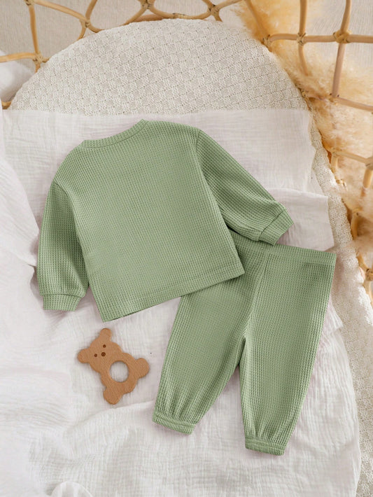 Conjunto verde tejido con sudadera y pantalón térmico
