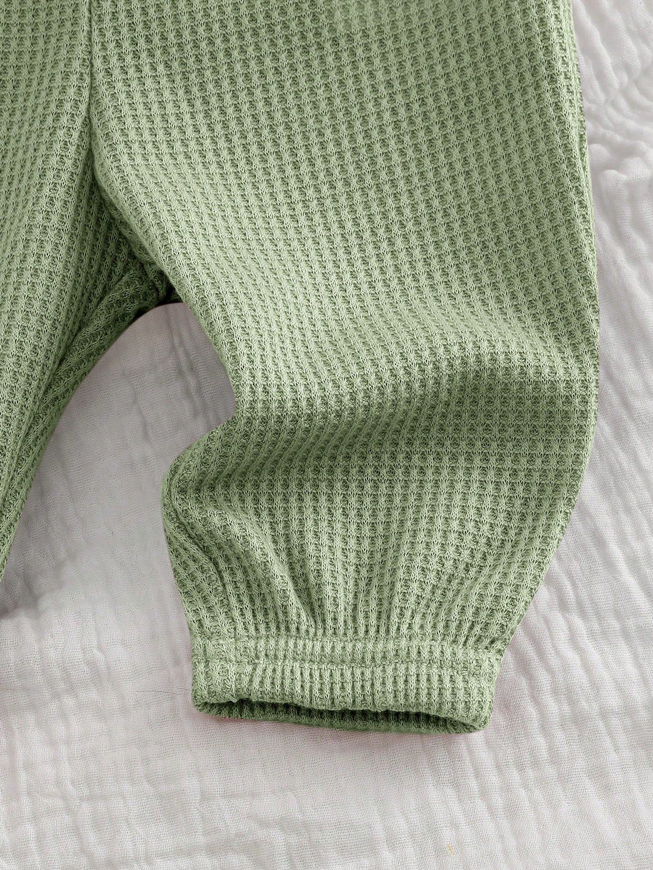 Conjunto verde tejido con sudadera y pantalón térmico