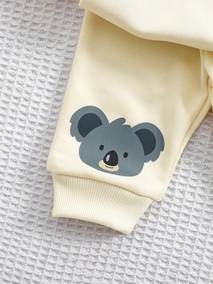 Prenda albaricoque pantalón para bebe con estampado de koala detalle