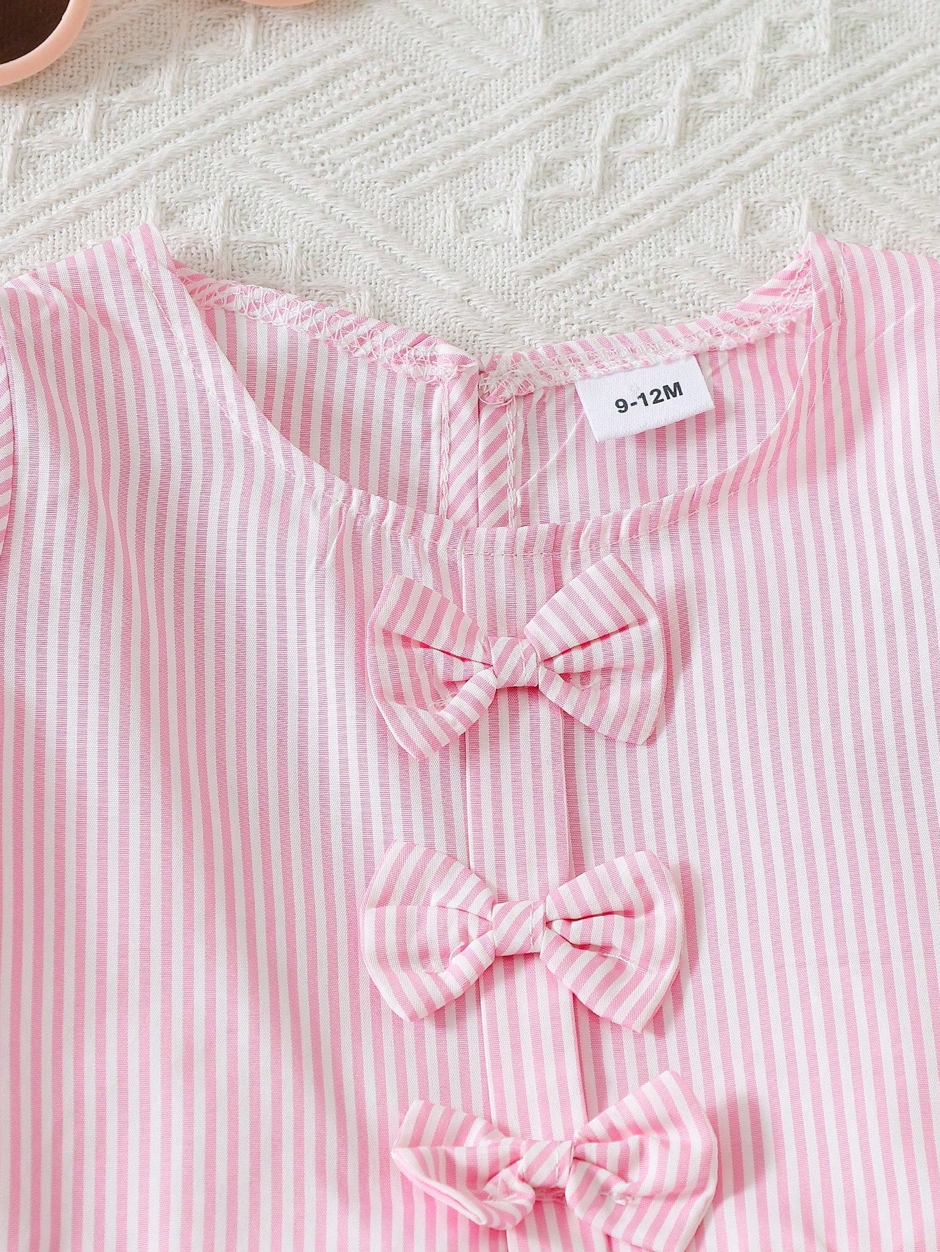 Set rosa con moños y shorts con volantes