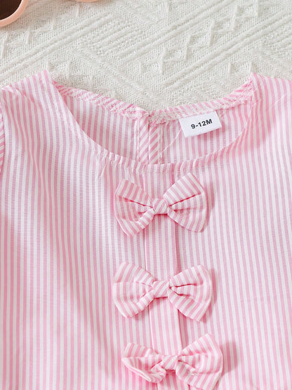 Set rosa con moños y shorts con volantes