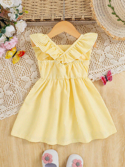 Prenda amarilla vestido para bebe a rayas con volantes vista posterior