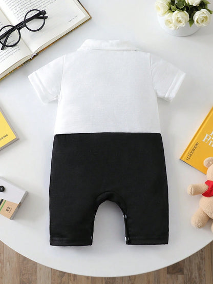 Pelele blanco negro moño elegante minimalista