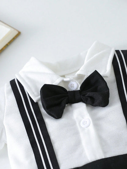 Pelele blanco negro moño elegante minimalista