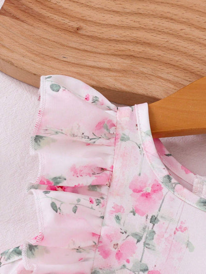 Vestido floral rosa con volantes y lazo