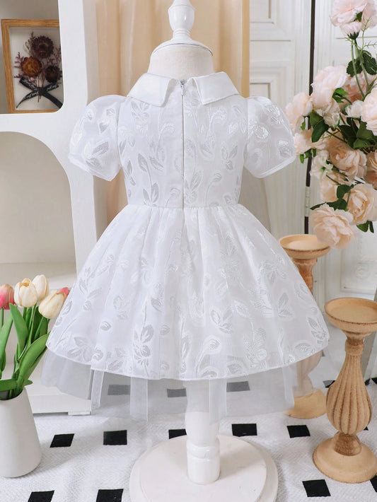 Vestido blanco elegante de malla con bordados
