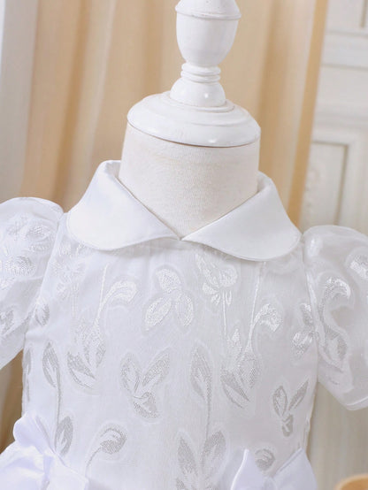 Vestido blanco elegante de malla con bordados