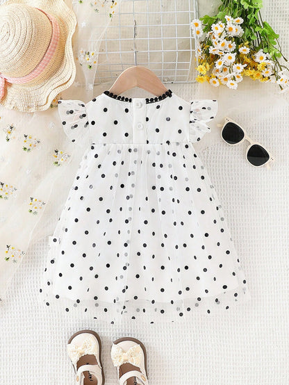 Vestido multicolor lunares elegante con lazo