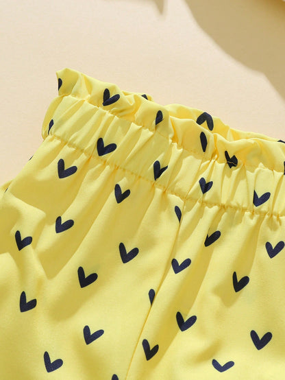 Conjunto amarillo dulce con estampado de gato