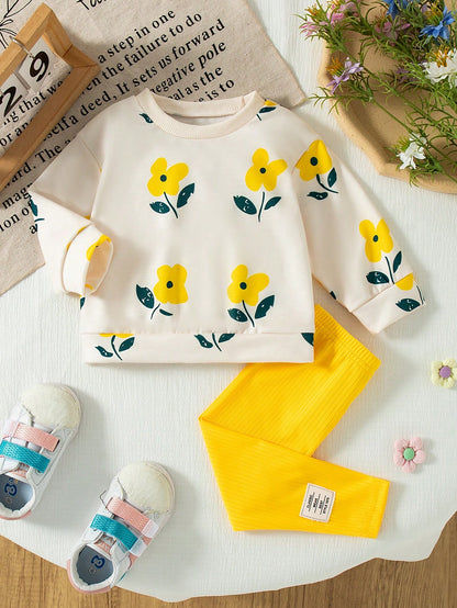 Conjunto floral crema y amarillo con leggings suaves