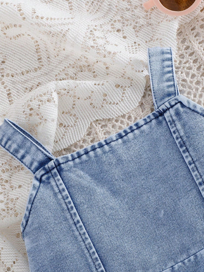 Vestido denim azul con tirantes y bolsillos laterales