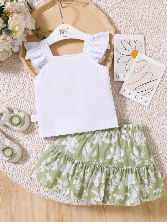 Conjunto blanco con falda verde floral para bebé