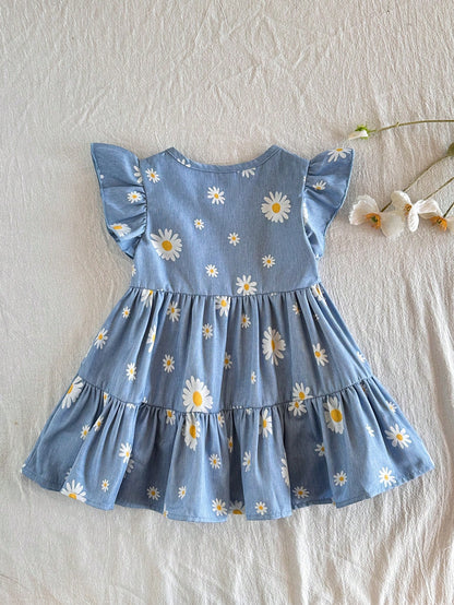 Prenda azul vestido floral para bebe vista posterior