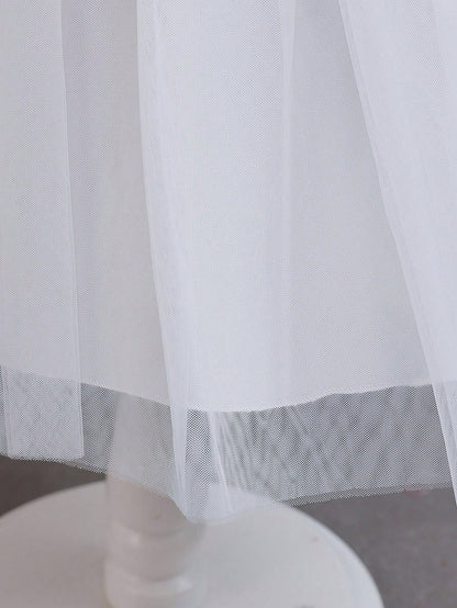 Prenda blanca vestido para bebe con detalle de falda de tul