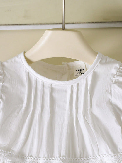 Vestido blanco con encaje francés y mangas farol dulces