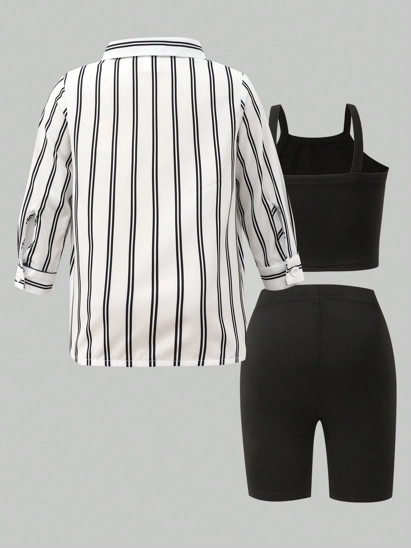 Prenda blanca y negra conjunto para bebe de tres piezas a rayas vista posterior