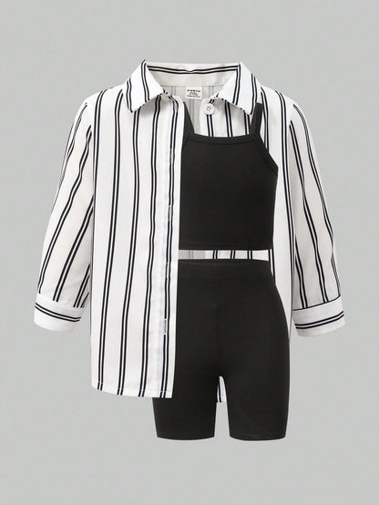 Prenda blanca y negra conjunto para bebe de tres piezas a rayas vista frontal
