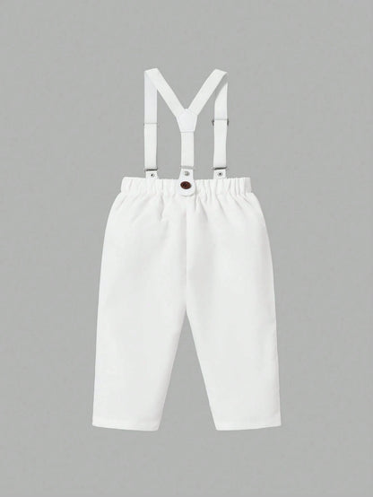 Prenda blanca pantalón para bebe con tirantes y botones