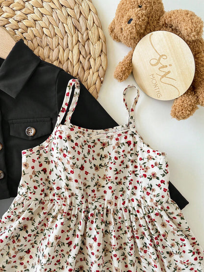 Prenda negra conjunto para bebe con detalle de vestido de tirantes estampado floral