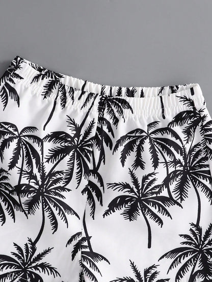 Prenda blanco negro short para bebe con estampado tropical cintura elastica