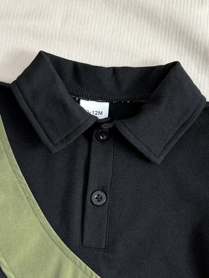 Prenda negra camisa polo para bebe con detalle de cuello y botones
