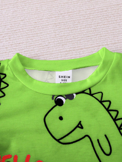 Prenda verde camiseta para bebe con cuello redondo detalle superior
