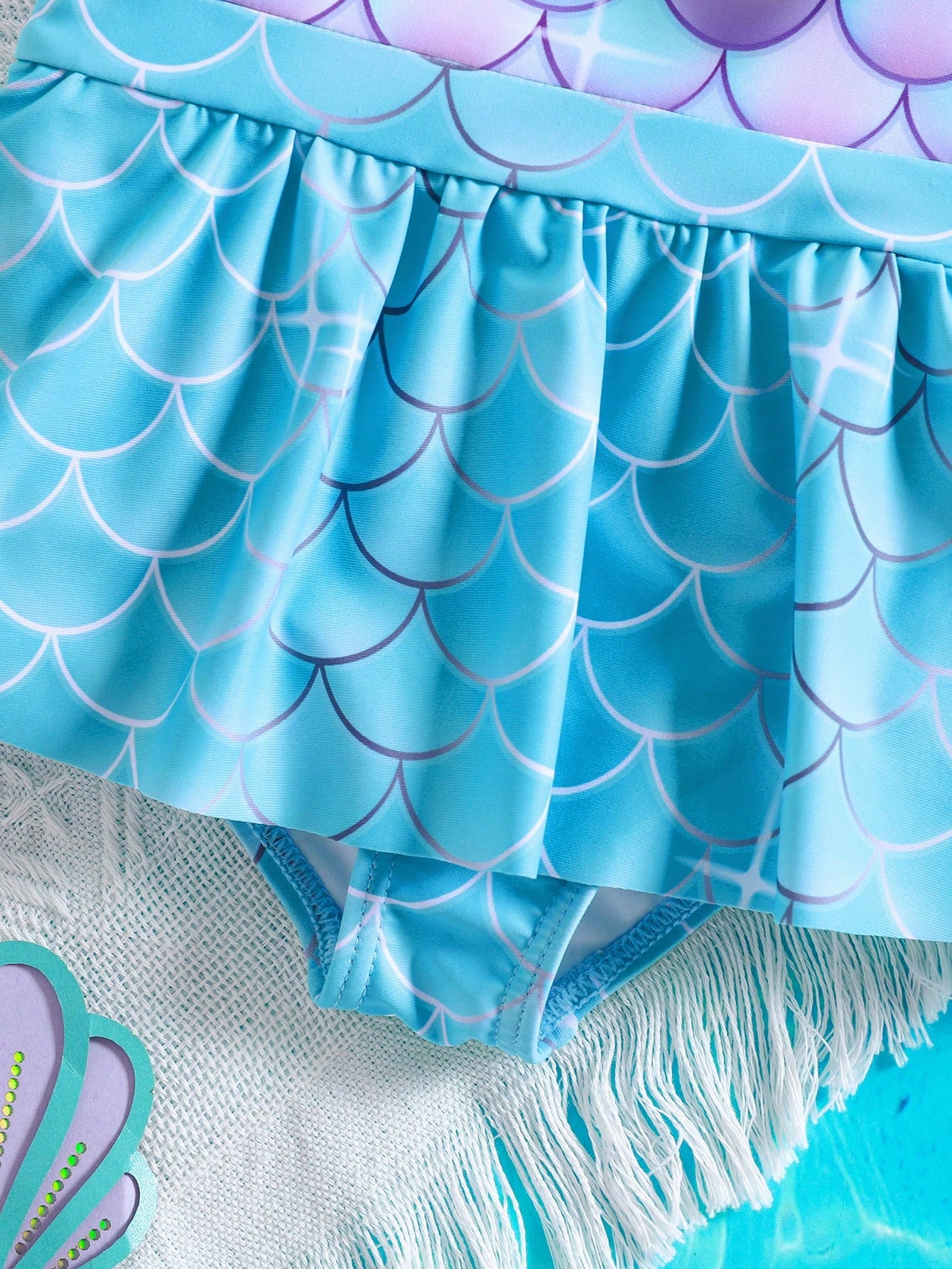 Prenda azul traje de baño sirena para bebe detalle de falda con textura escamas