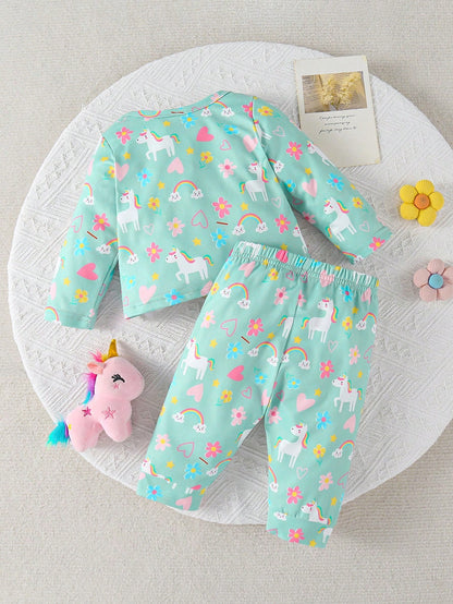 Conjunto verde bebé niña con unicornio arcoíris y flores