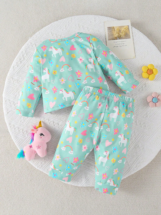 Conjunto verde bebé niña con unicornio arcoíris y flores