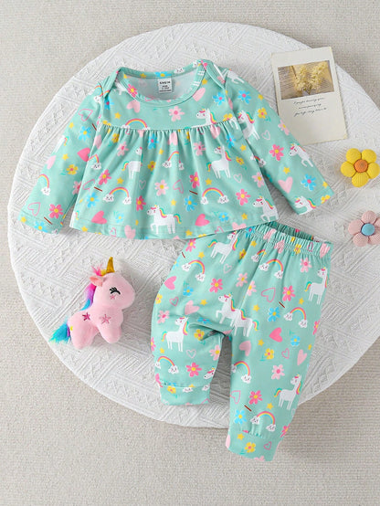 Conjunto verde bebé niña con unicornio arcoíris y flores