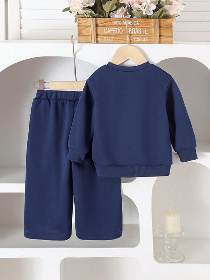 Conjunto elegante azul real con flores bordadas
