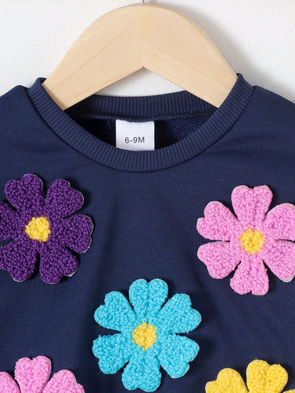 Conjunto elegante azul real con flores bordadas