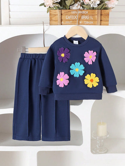 Conjunto elegante azul real con flores bordadas