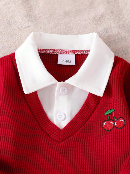 Blusa roja para bebe con detalle de cuello blanco y cerezas bordadas