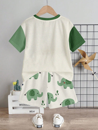 Prenda verde conjunto corto para bebe con estampado de elefante vista trasera

