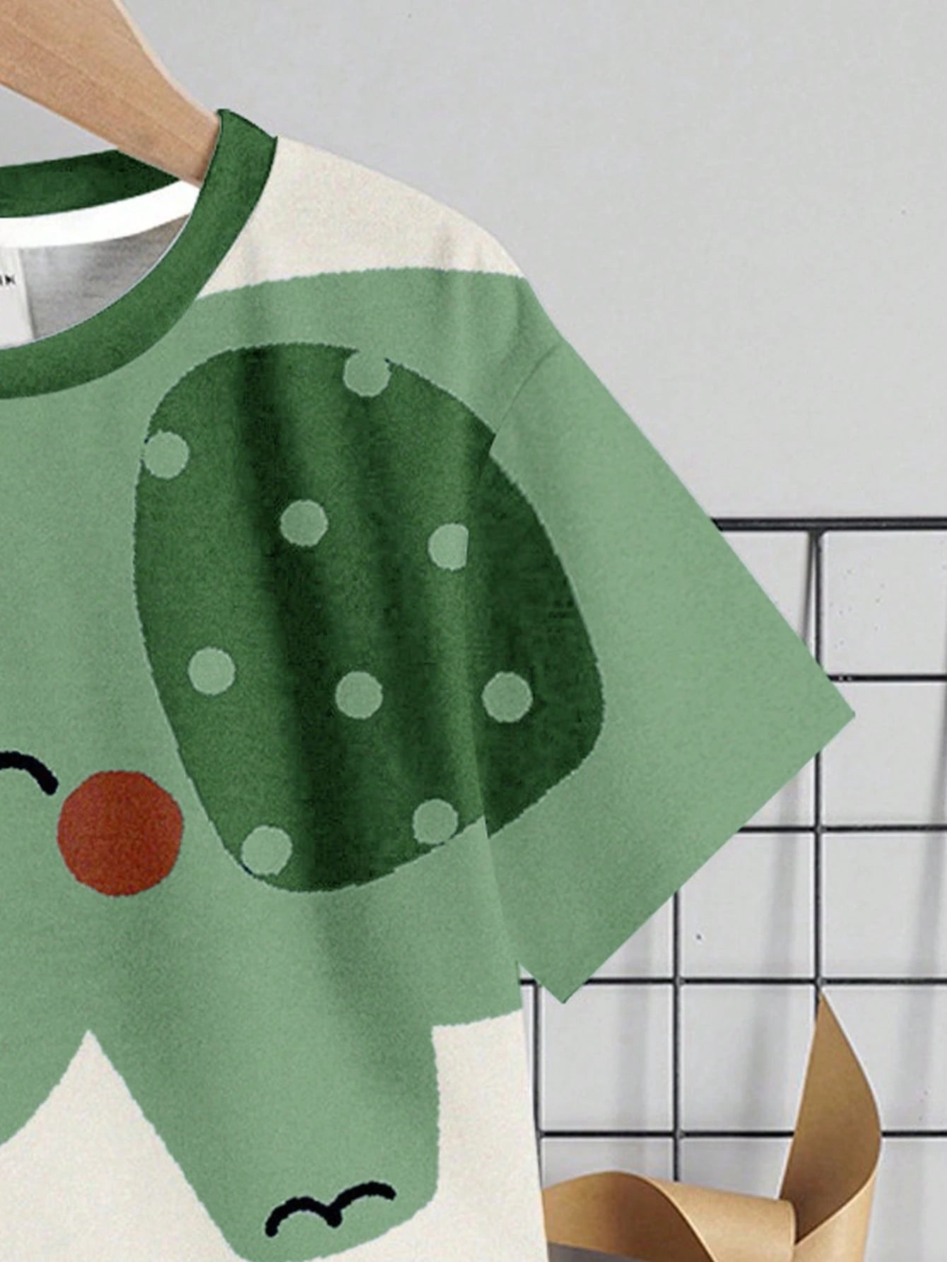 Prenda verde camiseta para bebe con elefante detalle manga