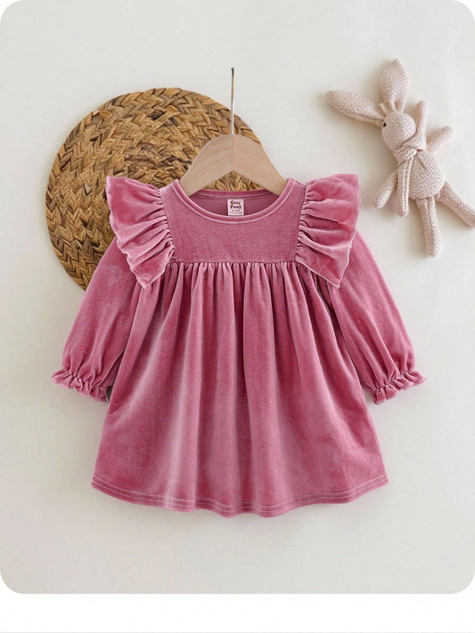 Vestido rosa bebé niña de terciopelo con volantes elegantes