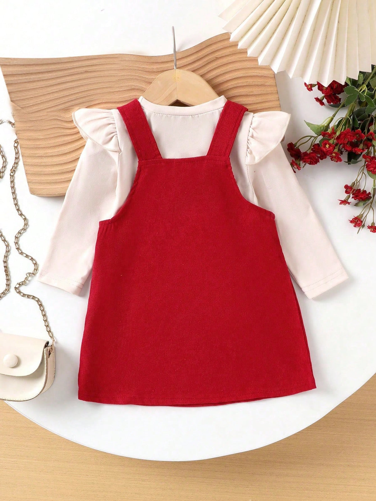 Prenda burdeos conjunto para bebe con vestido de tirantes vista trasera