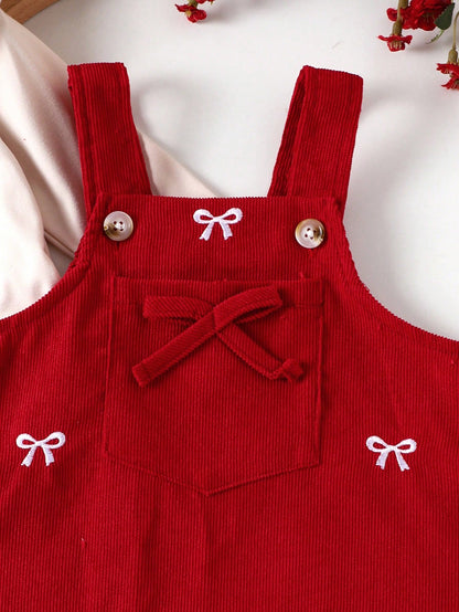 Prenda burdeos vestido para bebe detalle de bolsillo con lazo y botones