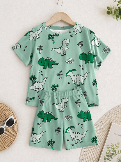 Prenda verde pijama para bebe con detalle de dinosaurio verde