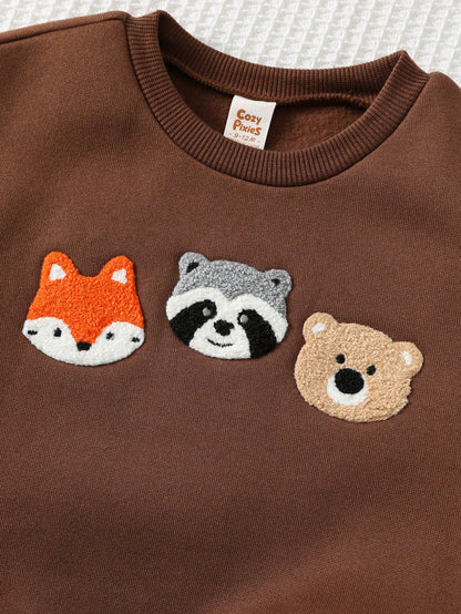 Conjunto café con sudadera de animalitos y jogger