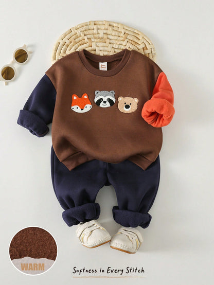Conjunto café con sudadera de animalitos y jogger