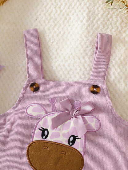 Prenda lila vestido para bebe con detalle de jirafa bordada y lazo