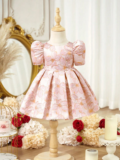 Prenda rosa vestido para bebe con estampado floral elegante vista frontal

