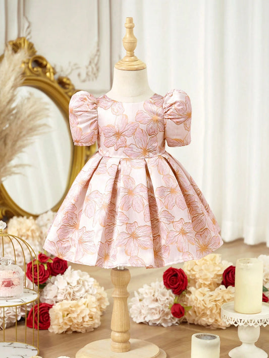 Prenda rosa vestido para bebe con estampado floral elegante vista frontal
