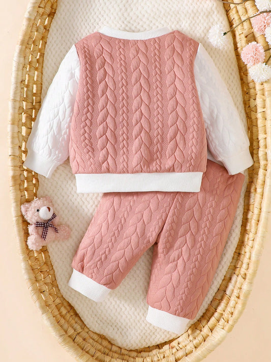 Conjunto acolchado rosa tejido botones delantero suave