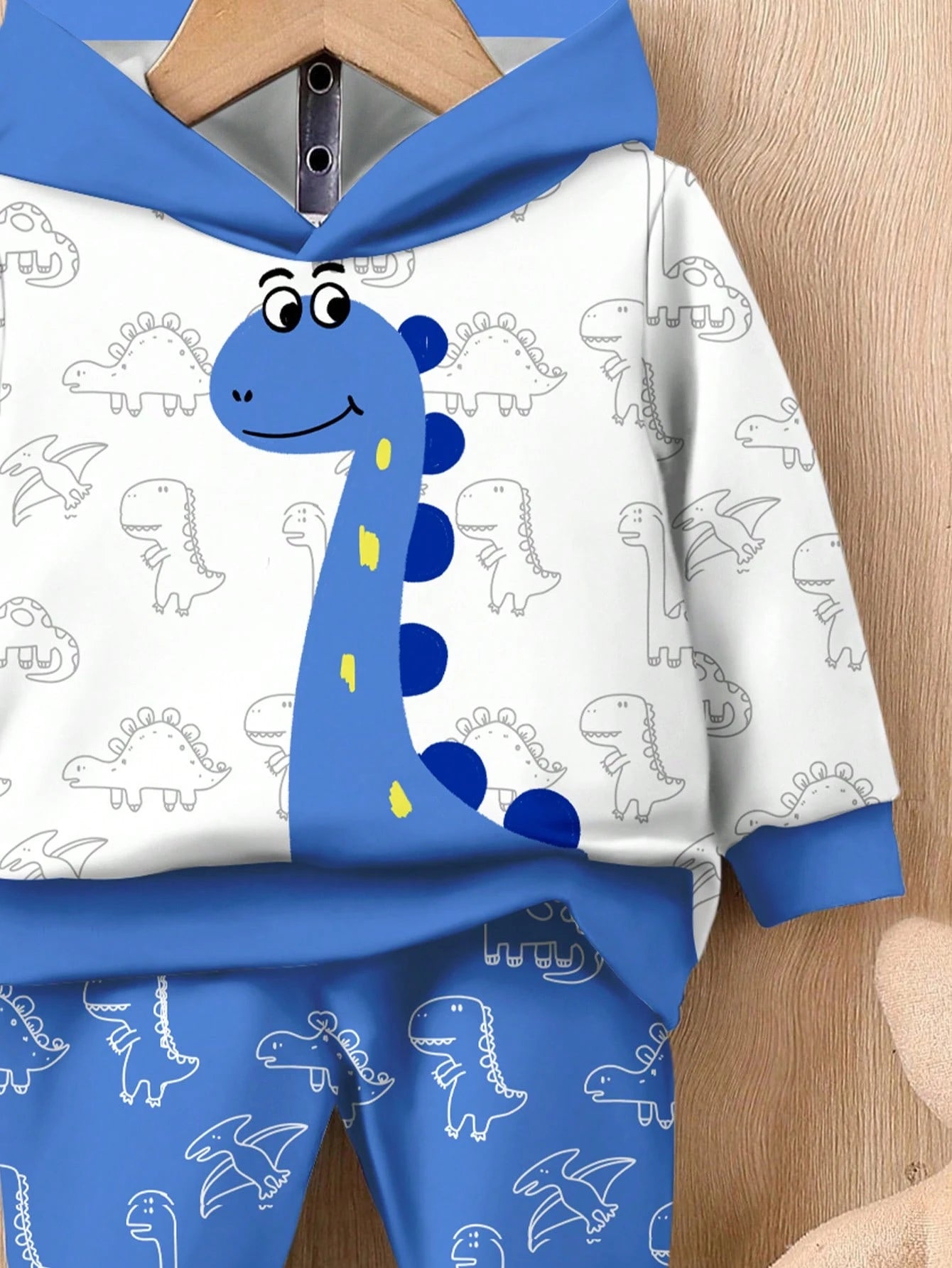 Conjunto sudadera azul con dinosaurio estampado casual