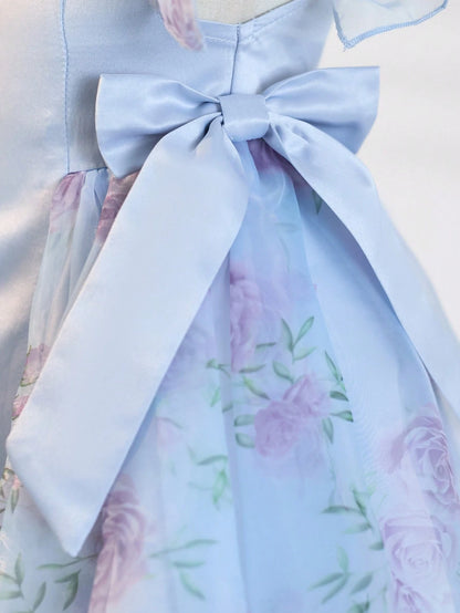 Prenda azul vestido para bebe con lazo lateral detalle