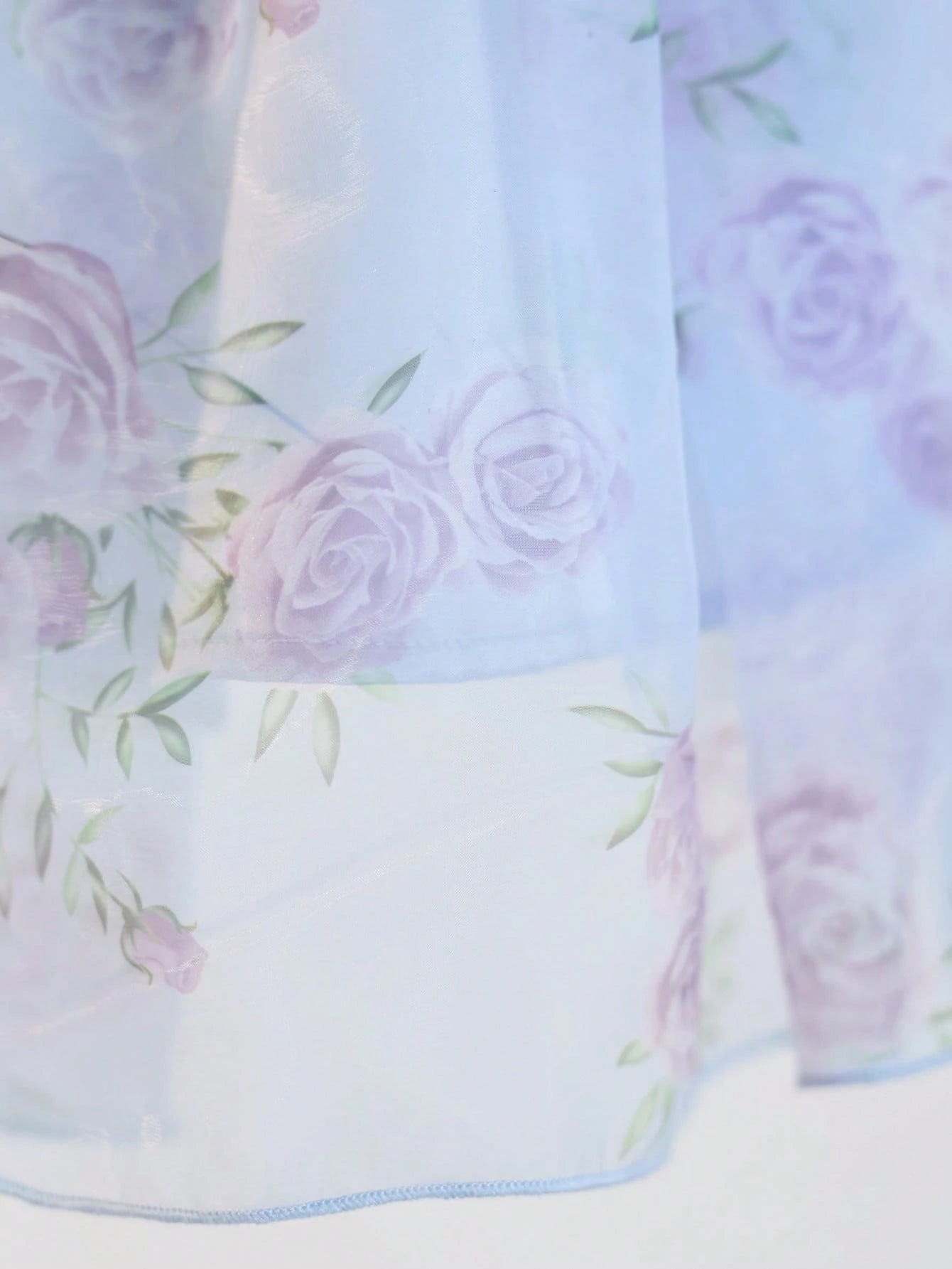 Prenda azul vestido para bebe con falda de organza floral detalle